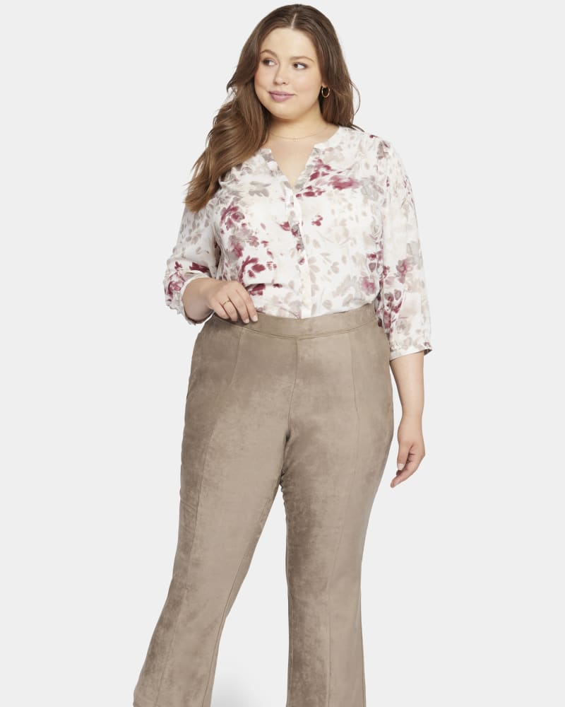 Front of a model wearing a size 16W Suede Pull On Slim Bootcut in Saddlewood by NYDJ. | dia_product_style_image_id:301518